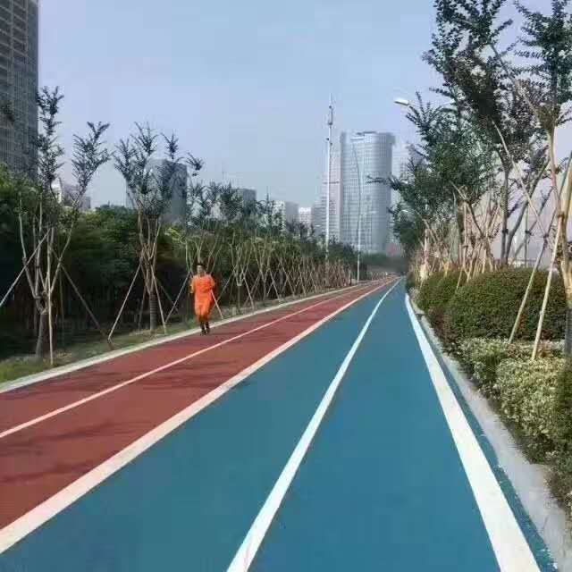 上海市透水混凝土，彩色压花地坪厂家透水混凝土，彩色压花地坪，艺术压模地坪彩色沥青路面