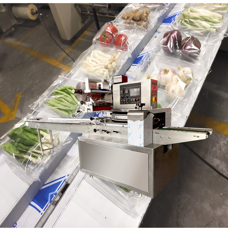 枕式包装机械 蔬菜自动打包机图片